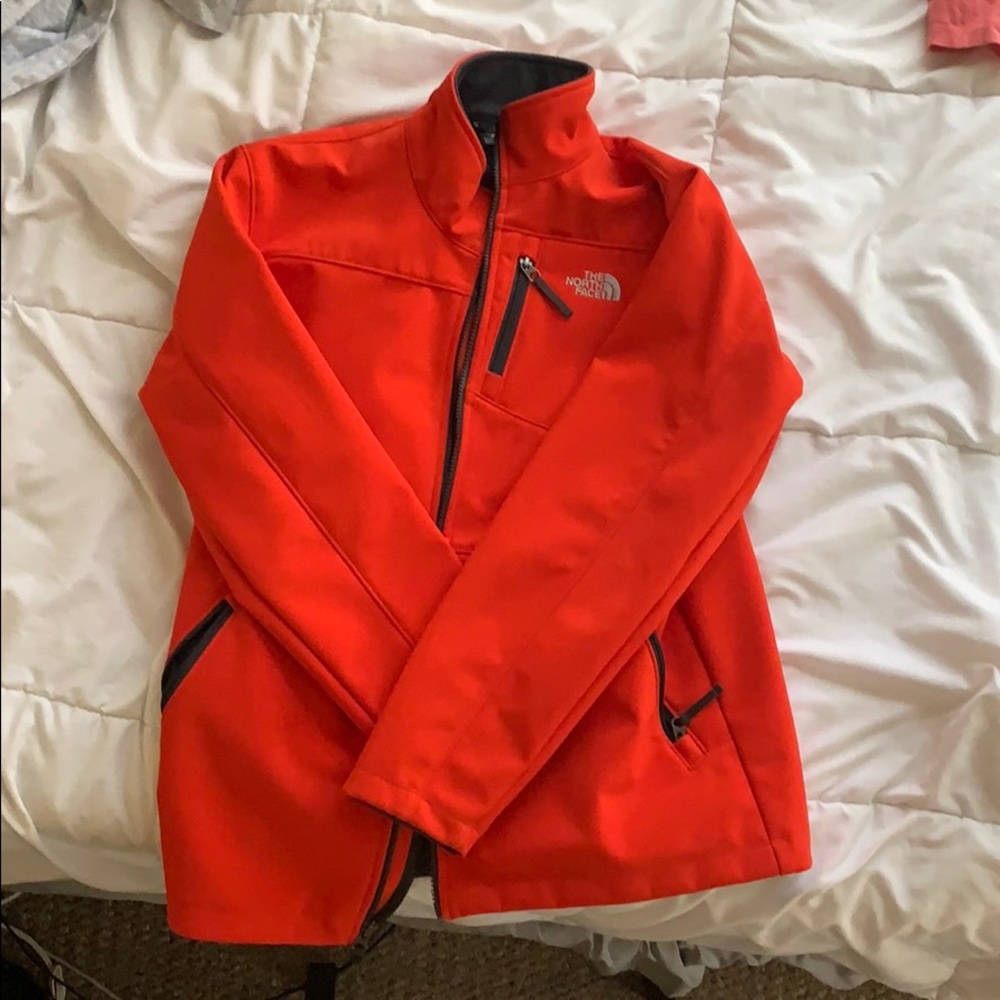 Orange heavy north face snowboarding/skiing jacket